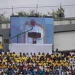 Pope Francis was seen on a big screen Tuesday as he addressed Mexican youth in Morelia.
